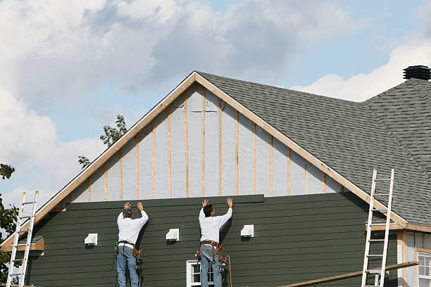Professional Emergency Siding Repair technician working in West Liberty, KY